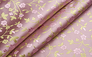 pink and green floral textile
